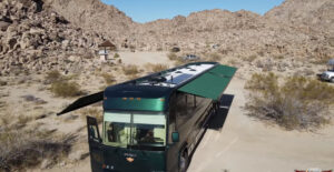 MCI Bus Conversion with Awning Extended