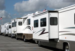  Row of Class A motorhomes with slideouts extended