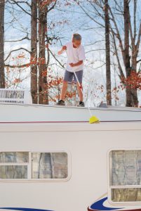 Sweeping RV slideout roof