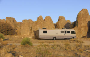 "A class a motorhome parked at a campsite at City of Rocks State Park near Deming, New Mexico, USA."