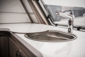  Circular RV Camper Sink and Faucet. Elegant Recreation Vehicle Interior.